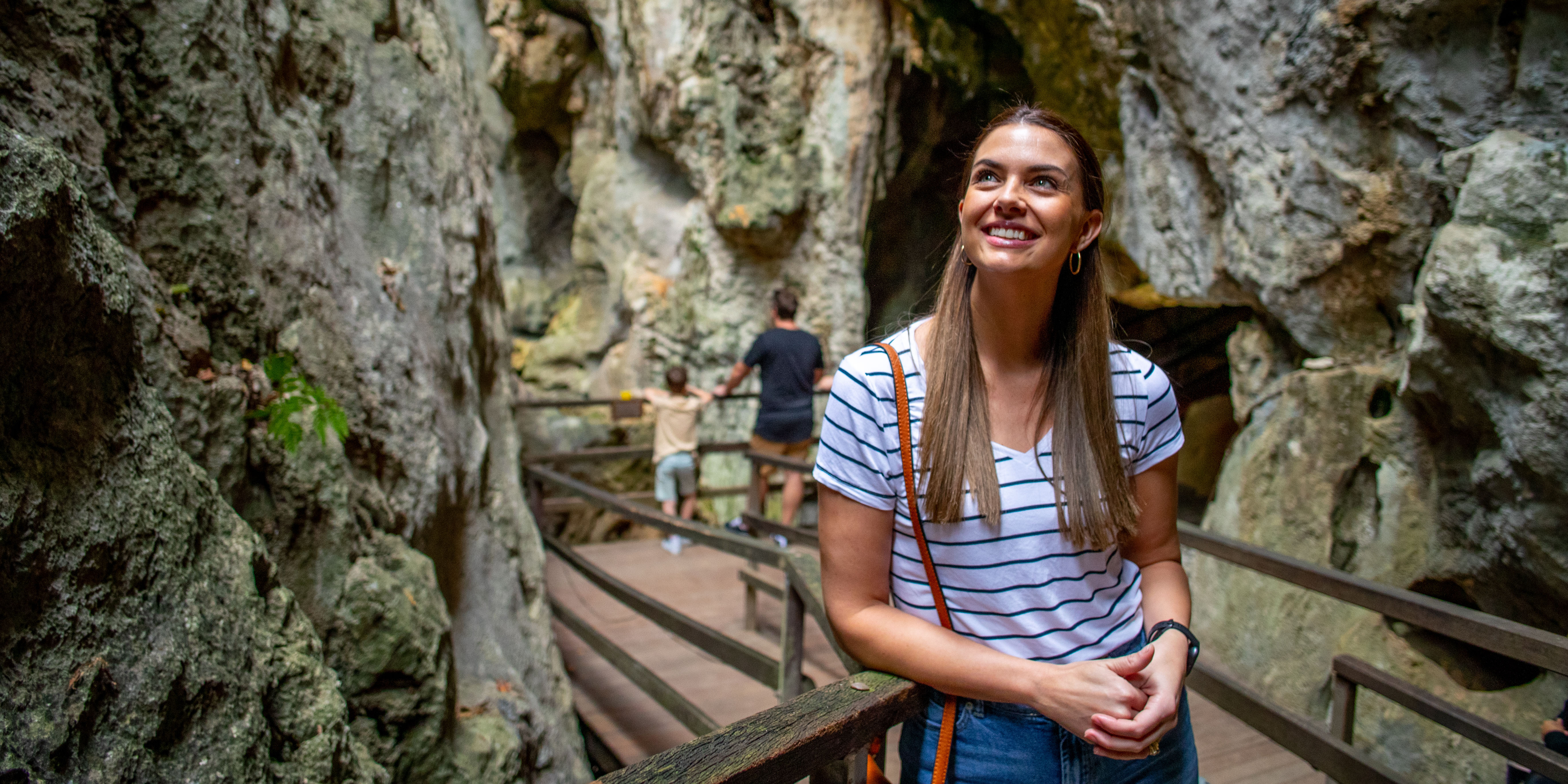 family exploring the Capricorn Caves