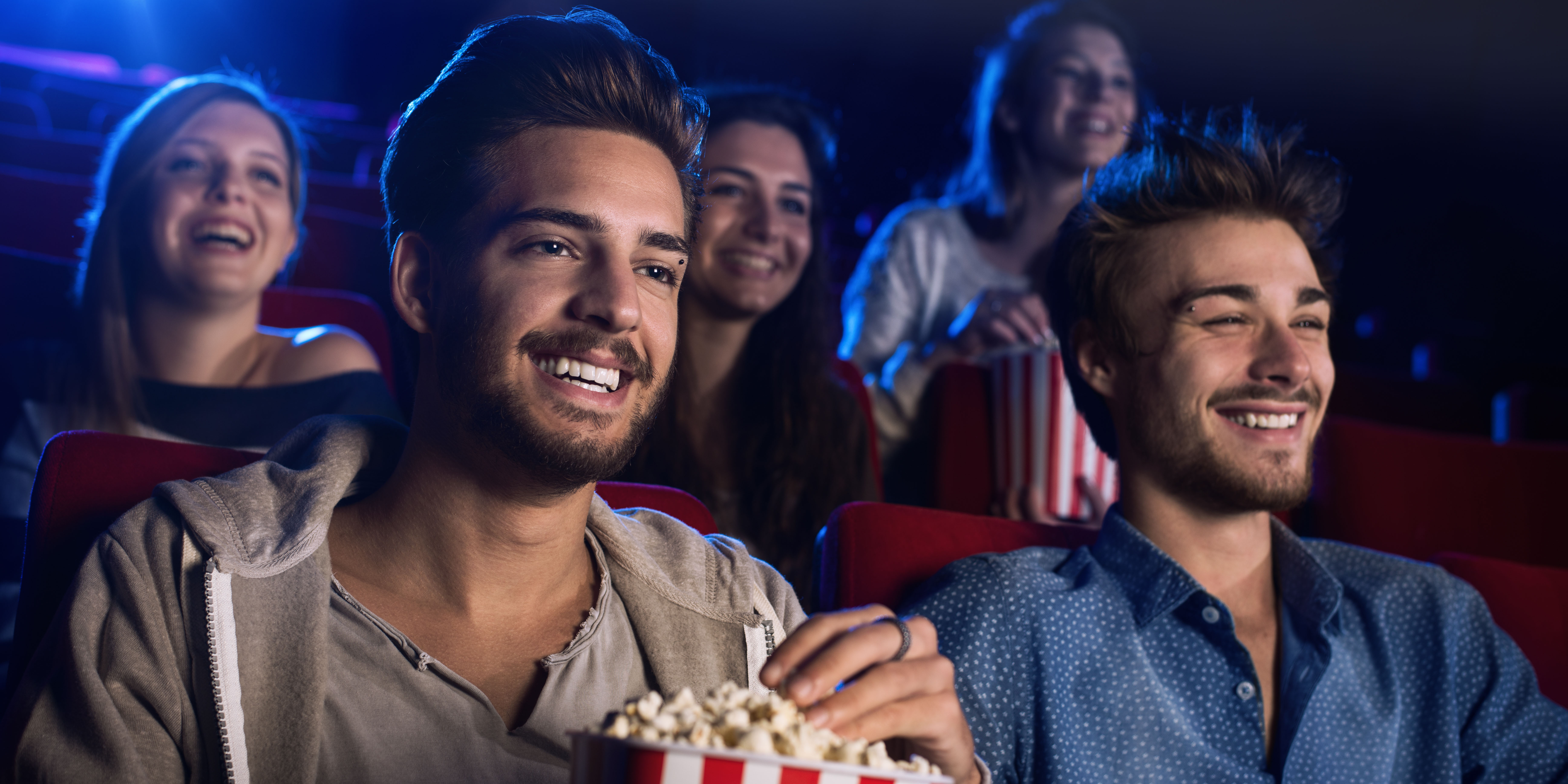 children enjoying the movies